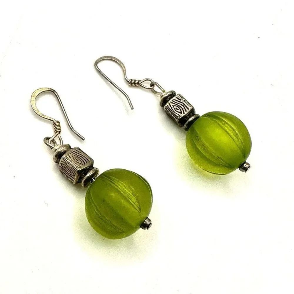 Silver tone and green bead drop earrings